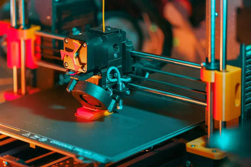 Detailed view of a 3D printer, highlighting the printing process and technological innovation